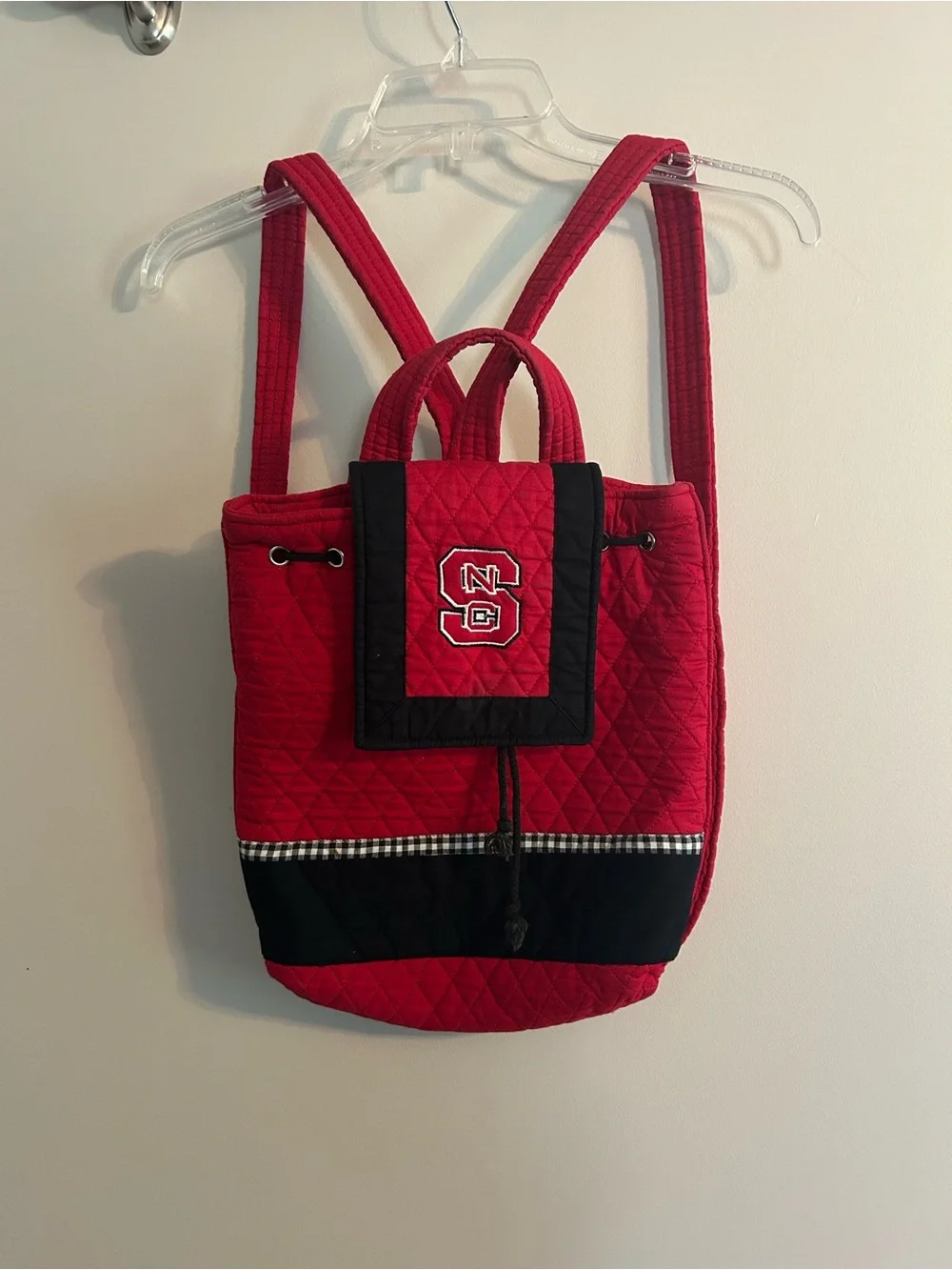 Embroidered N.C. State Red Drawstring quilted Backpack Tote with Black Trim